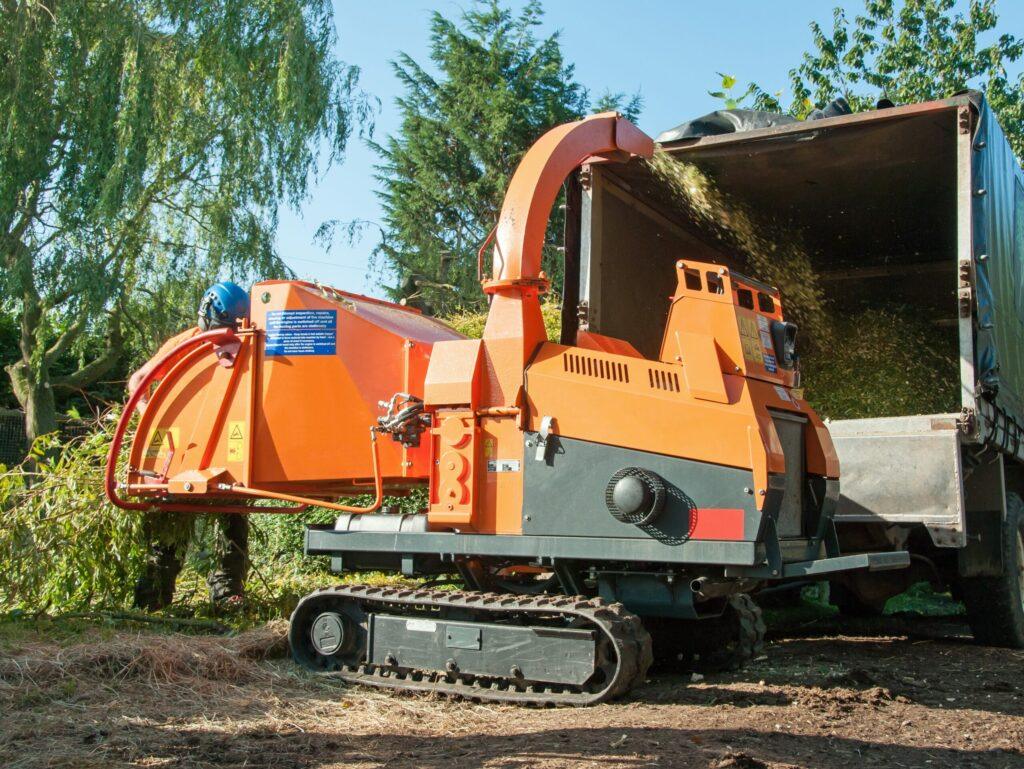 Machine that cuts tree branches into smaller pieces